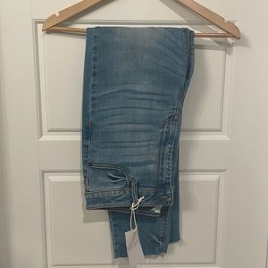 Carly Jean Los Angeles light wash jeans.